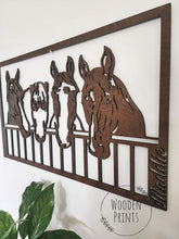 Rustic wooden horse wall art displayed as farmhouse wall décor in a home interior